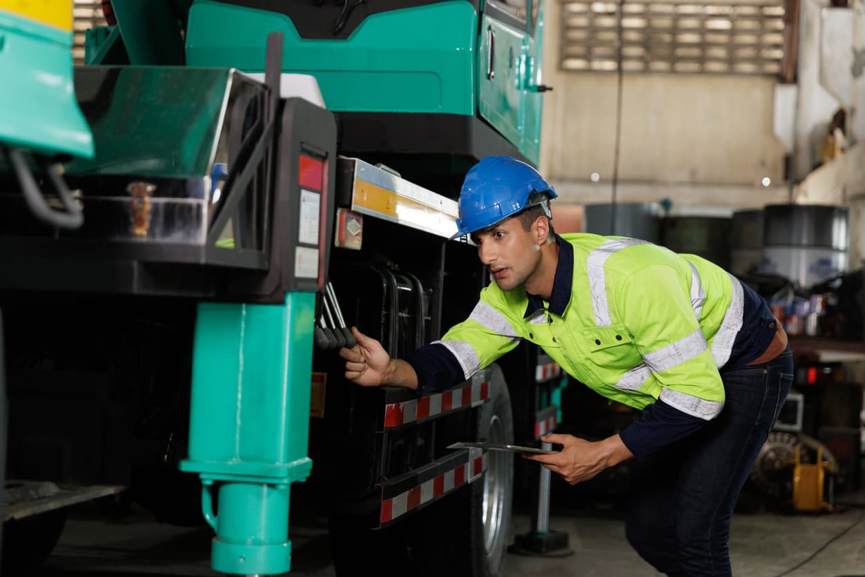Technician completing an inspection on a mobile device in the field