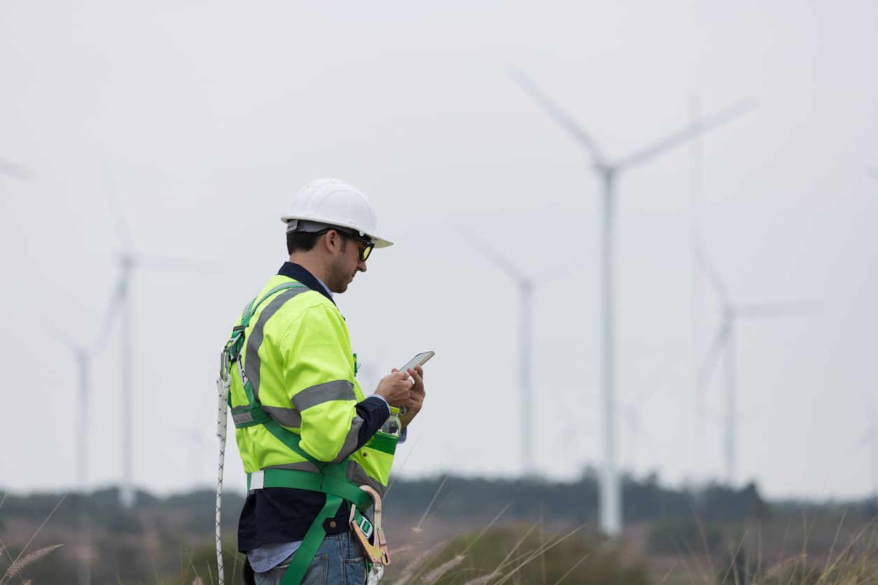 Field technician capturing an inspection on a mobile phone