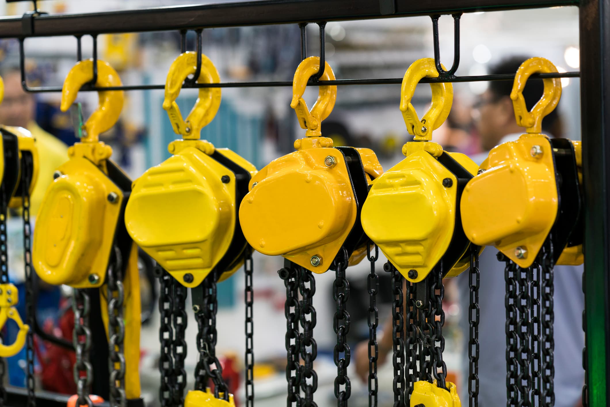 Industrial chain hoists in warehouse facility
